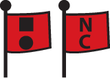Two red code flags, one with a ball under a square, the other with N over C.